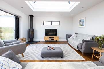 Chill out and relax in front of the Smart TV after a busy beach day.