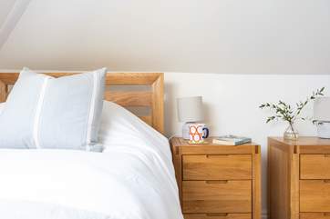 This pretty bedroom has a gorgeous en suite bathroom.