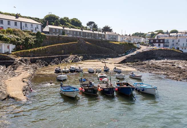The charming village centre is a short walk away, with a pretty harbour and selection of shops and eateries.