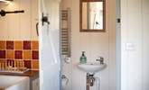 The en suite shower-room sits to the right of the hut.  - Thumbnail Image