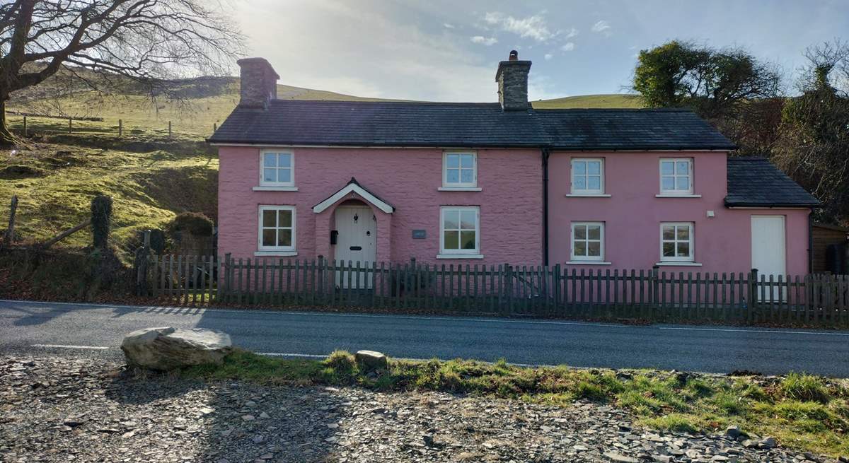 The owner's gorgeous pink cottage is a great landmark to look for when finding Ffion. 