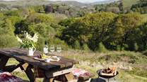 Why not dine al fresco by the warmth of the fire-pit? 