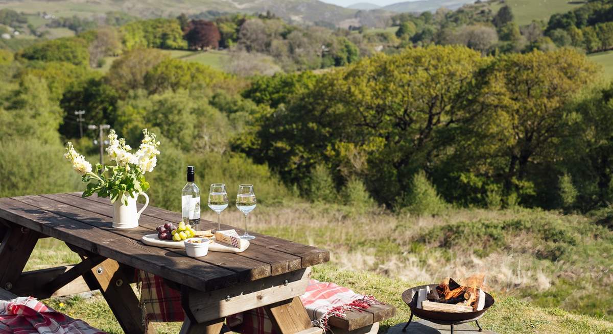 Why not dine al fresco by the warmth of the fire-pit? 