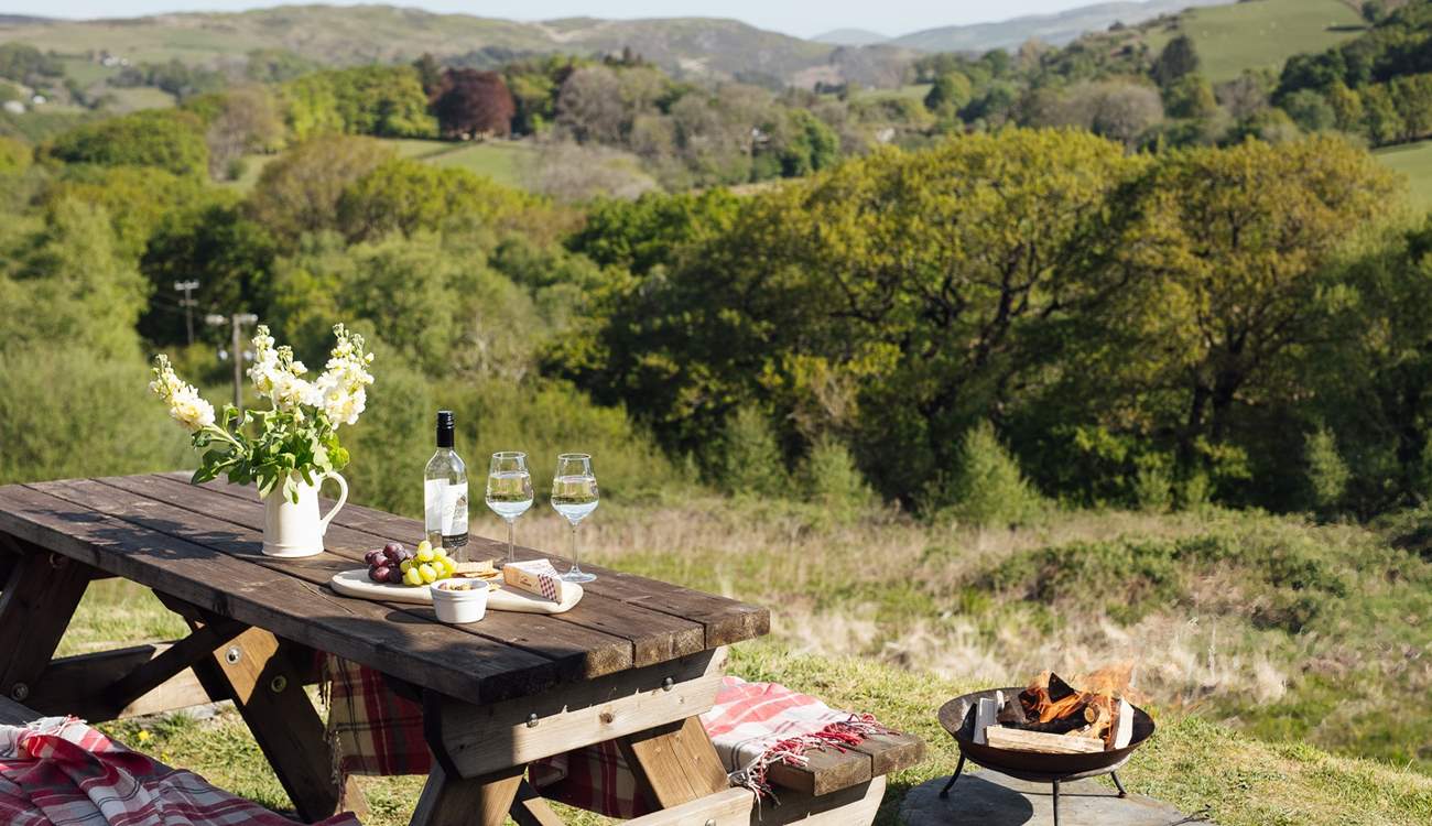 Why not dine al fresco by the warmth of the fire-pit? 