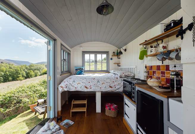 The double bed is perfectly positioned to make the most of your surroundings. 