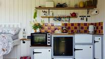 The kitchen is ideal for prepping your lazy Sunday brunch or romantic Friday dinner. 