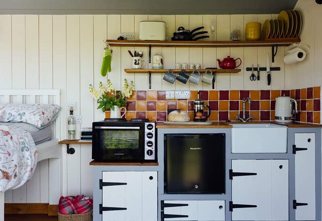 The kitchen is ideal for prepping your lazy Sunday brunch or romantic Friday dinner. 