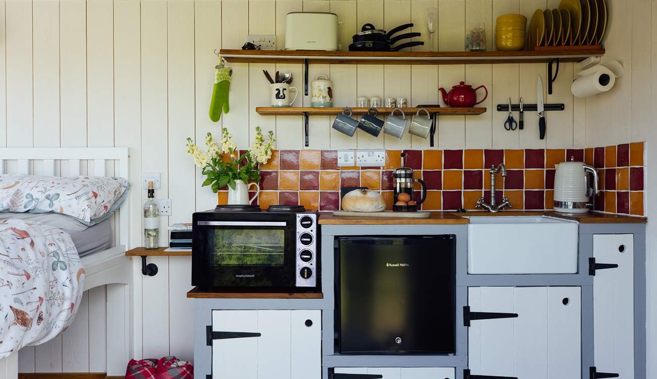 The kitchen is ideal for prepping your lazy Sunday brunch or romantic Friday dinner. 