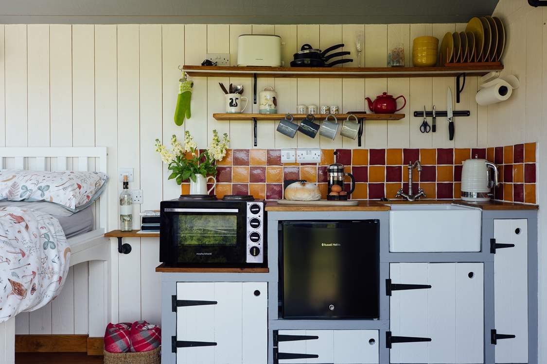 The kitchen is ideal for prepping your lazy Sunday brunch or romantic Friday dinner.