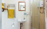 The en suite shower room sits to the right of the hut.  - Thumbnail Image