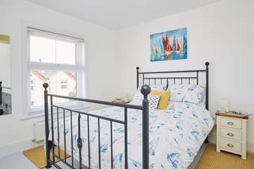 A fabulous King size sits next door in bedroom two.