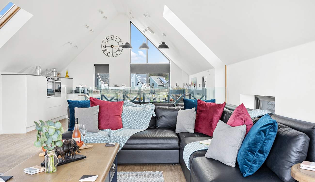 Relax on the indulgent corner sofa and enjoy the light and airy atmosphere created by the high ceilings.