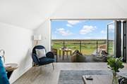 Open up the bi-folding doors to enjoy the fresh Devonshire air and of course the views!