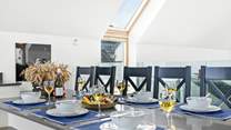 The opulent dining-table is perfect for sociable family dinners.
