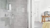 You'll find a wonderfully finished en suite attached to this room.