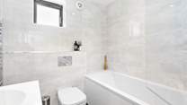 The excellent family bathroom provides the ideal place to refresh yourself after a big day out.