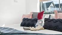 Plush cushions and snug blankets ensure a great night's sleep.