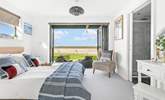 Next door you'll find bedroom two, with its fantastic bi-folding doors and views that will captivate you! - Thumbnail Image