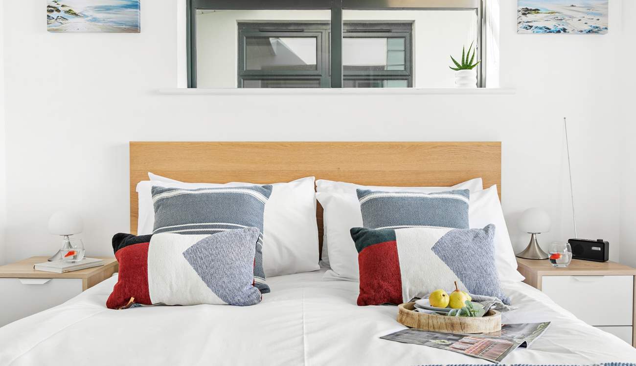 You'll find another inviting king-size bed in this room.