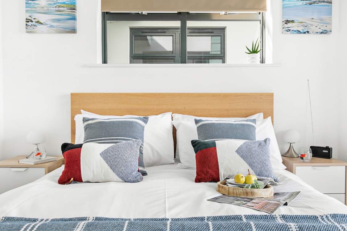 You'll find another inviting king-size bed in this room.