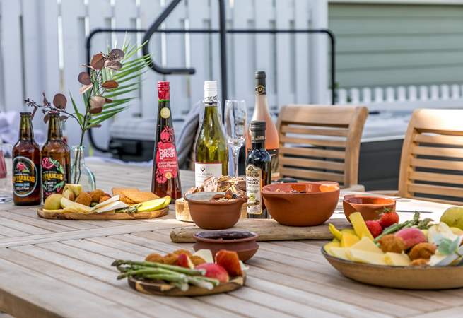 Sample some of the local delicacies at the fantastic wooden dining area.