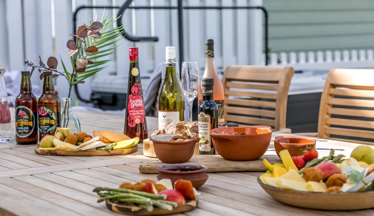 Sample some of the local delicacies at the fantastic wooden dining area.