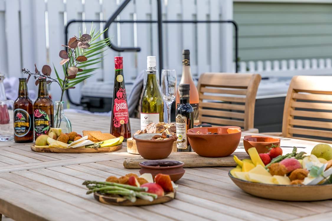 Sample some of the local delicacies at the fantastic wooden dining area.