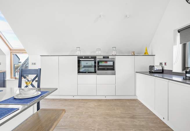 The sleek kitchen has everything you'll need to prepare your favourite meals.