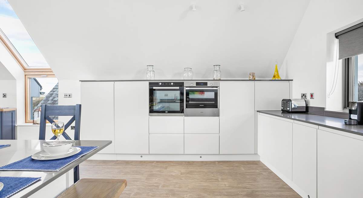 The sleek kitchen has everything you'll need to prepare your favourite meals.