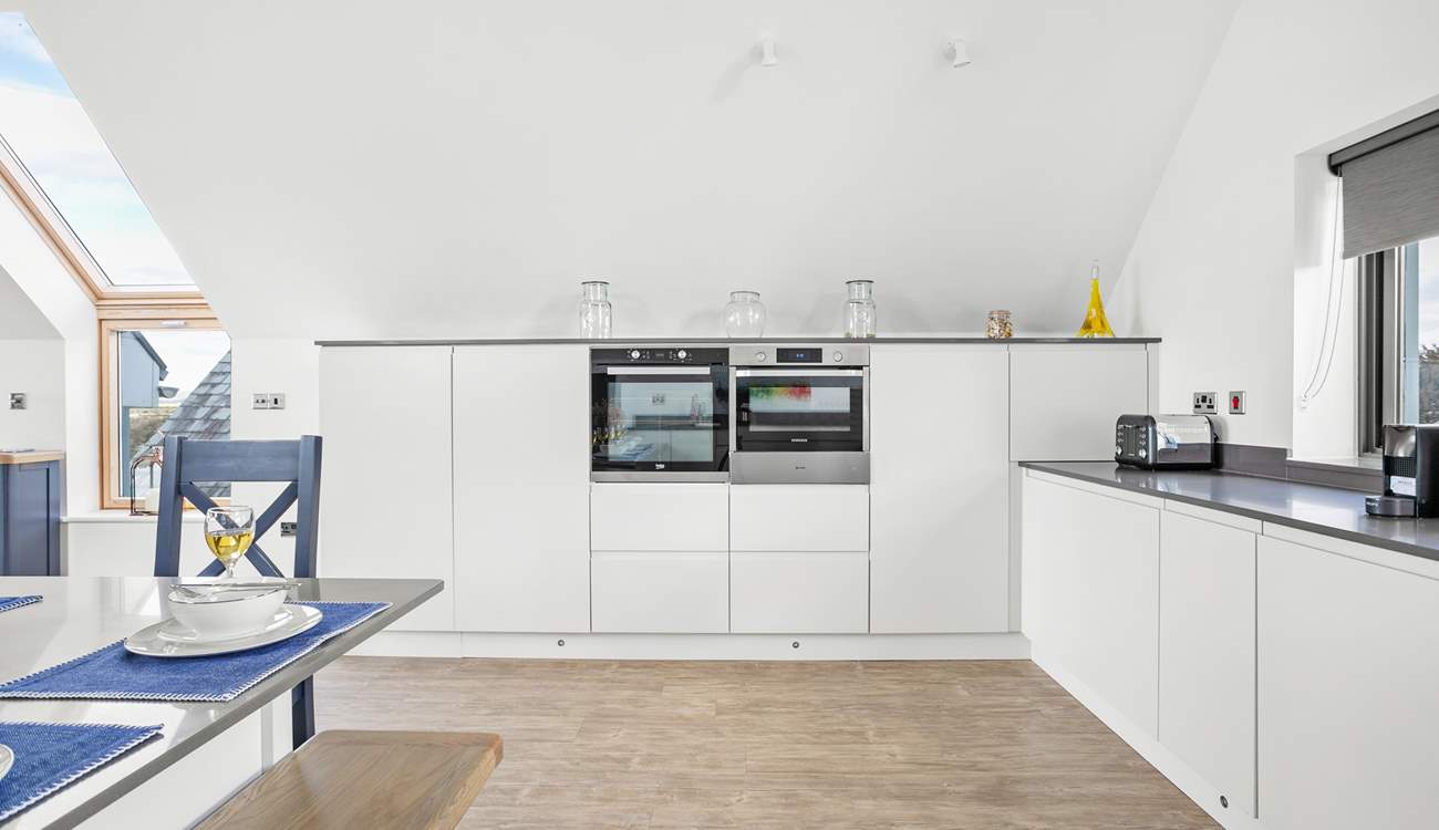 The sleek kitchen has everything you'll need to prepare your favourite meals.