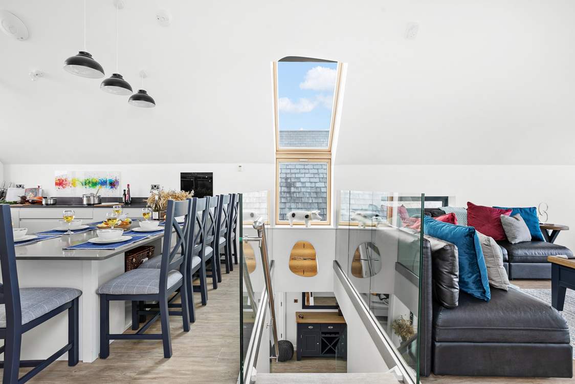 Thanks to the skylights on both sides of the house, it's filled with light no matter the season. Please note, a stair-gate cannot be installed here owing to the glass.