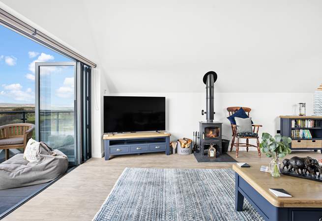 A beautiful wood-burner ensures the room stays nice and cosy in the evenings whilst you snuggle down and watch a film on the Smart TV!