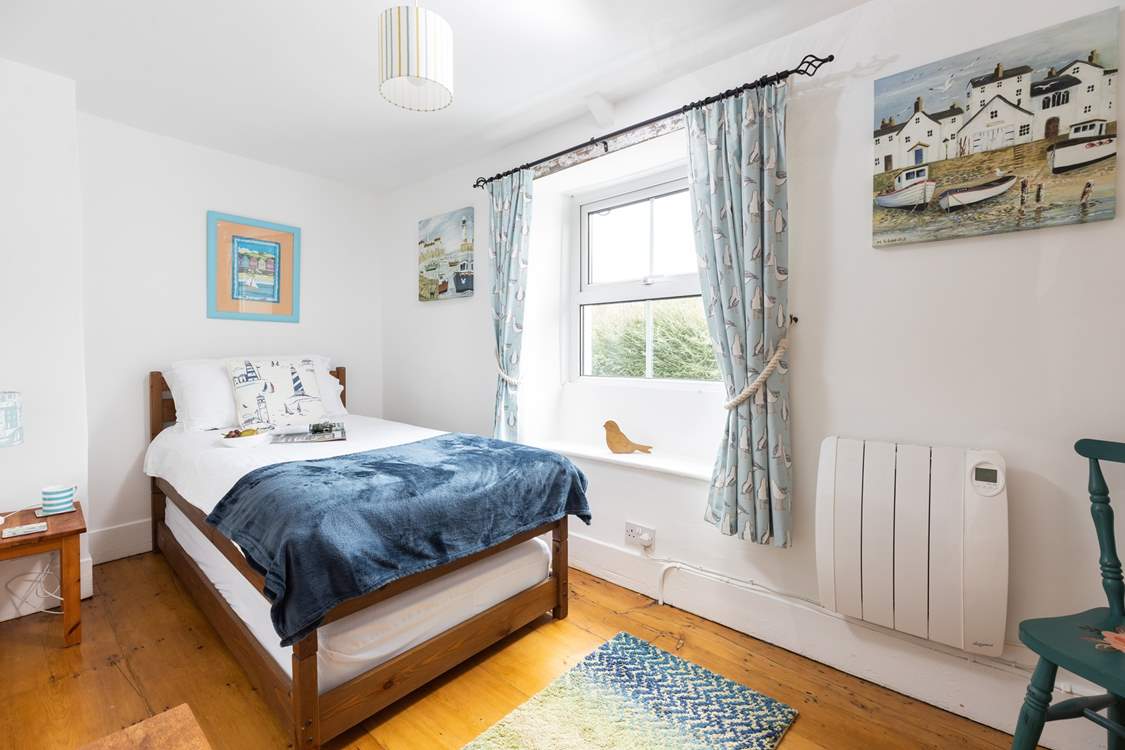 Bedroom 3 the single bedroom is perfect for either a child or adult. This bedroom can be found at the front of the house.