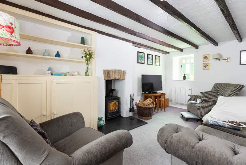 The sitting-room has a wood-burner to keep you cosy throughout the year. 