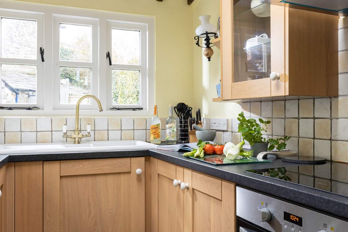 A perfect kitchen looking out over the back garden. Shop at local farm shops and roadside stalls for the freshest of produce.