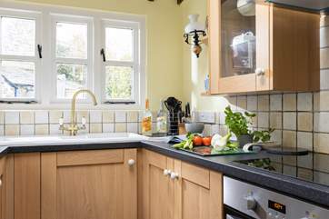A perfect kitchen looking out over the back garden. Shop at local farm shops and roadside stalls for the freshest of produce.