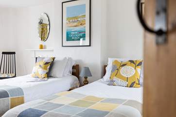 Elegant bedroom one has a 'zip and link' bed giving you the luxury to choose either a super-king double bed or twins.