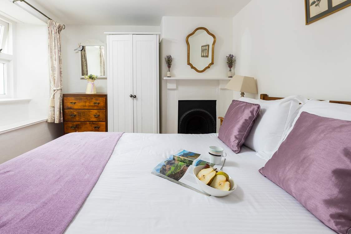 Pretty bedroom 2 with views over the back garden.