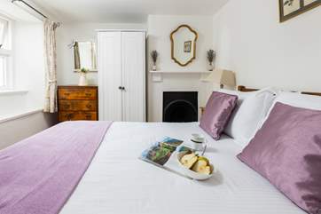 Pretty bedroom 2 with views over the back garden.