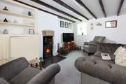 Welcome to Fisherton Cottage. 
Gather everyone in the sitting-room to watch a movie on the Smart TV.