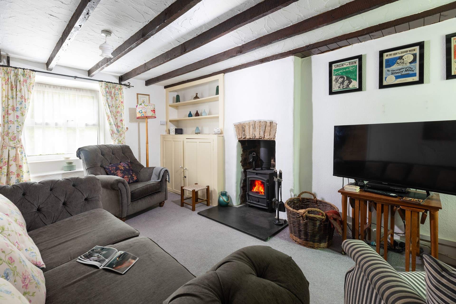 The sitting-room has a wood-burner to keep you cosy throughout the year. 