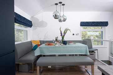 The dining nook seats up to eight guests.