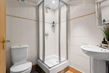 Bedroom 1's en suite shower-room.