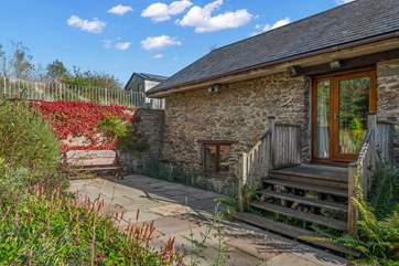So many pretty spots to enjoy with a good book. Please take care when venturing up and down the steps which surround the barn.