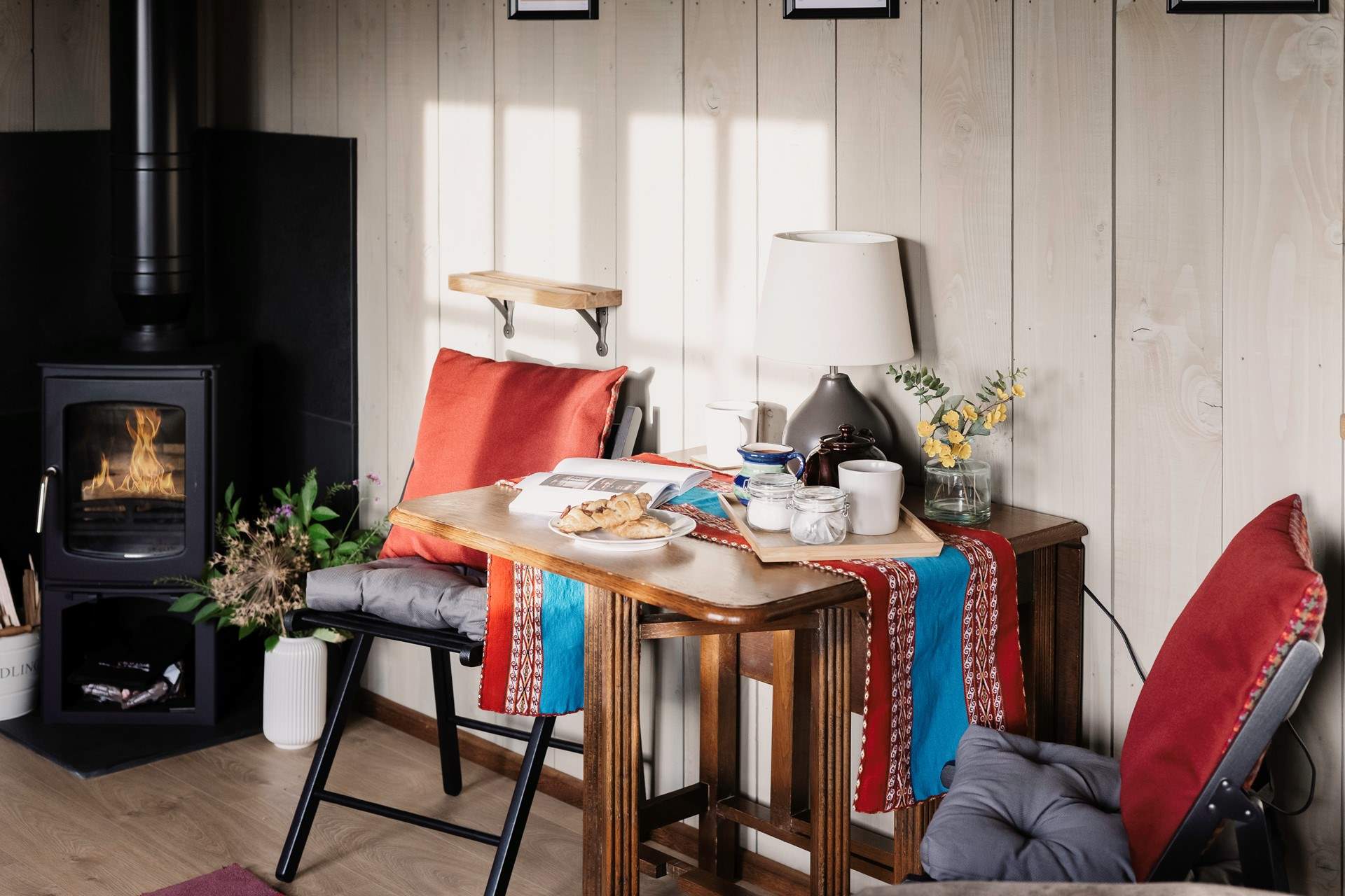 The warming wood-burner will keep you nice and toasty throughout the seasons.