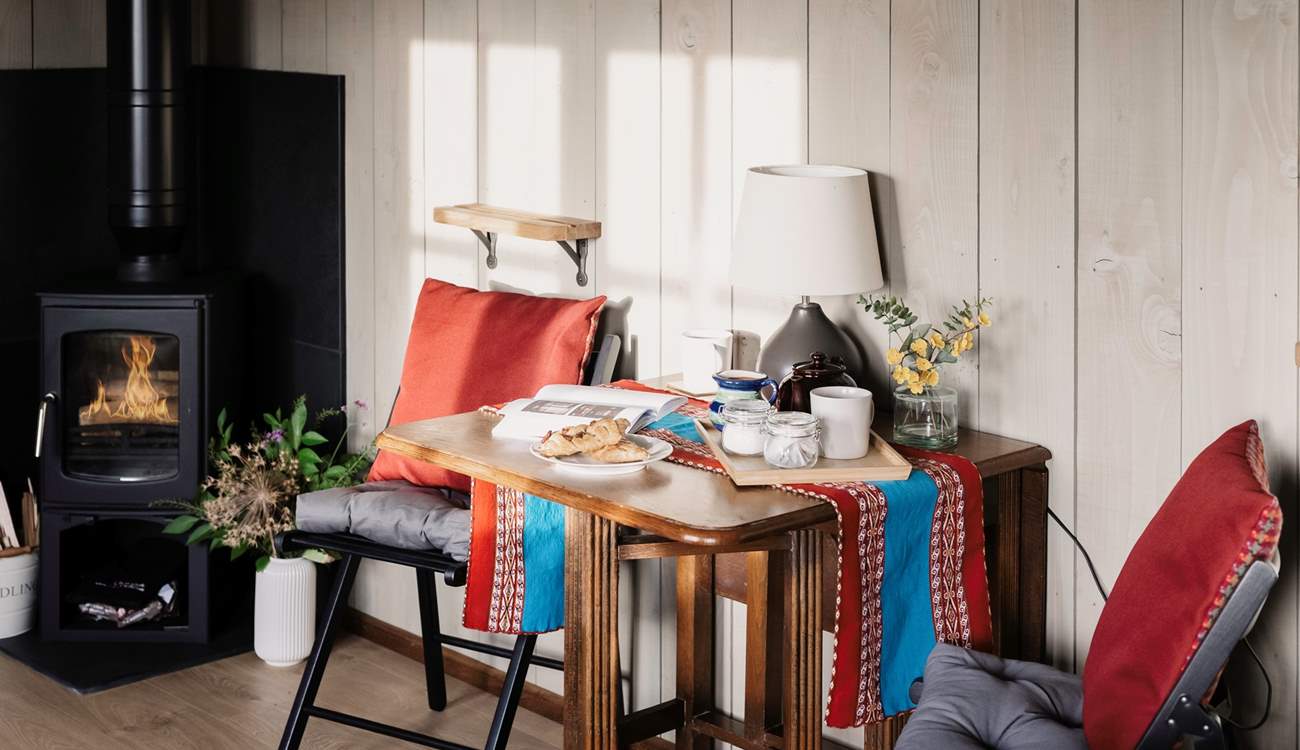 The warming wood-burner will keep you nice and toasty throughout the seasons.