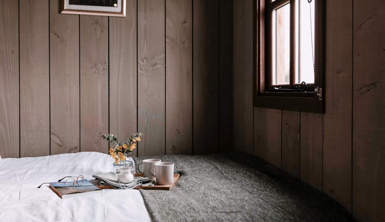 Admire the sweeping countryside views from the sumptuous double bed, cup of coffee in hand. 