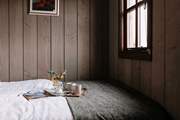 Admire the sweeping countryside views from the sumptuous double bed, cup of coffee in hand.