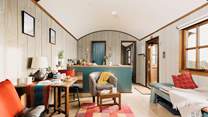 The mixture of rustic and chic furnishings complete the character of this lovely hideaway.