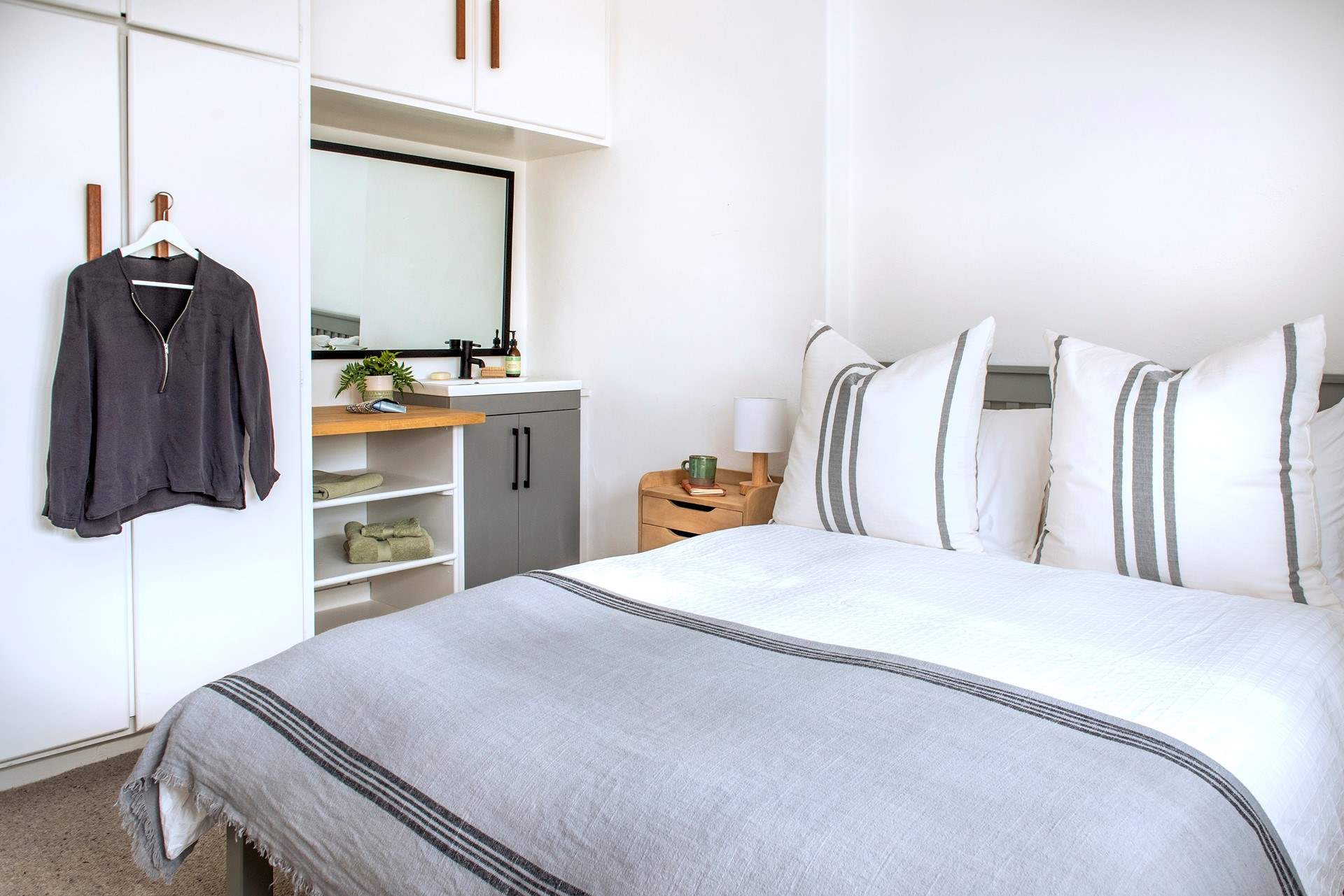 Restful tones in bedroom four.